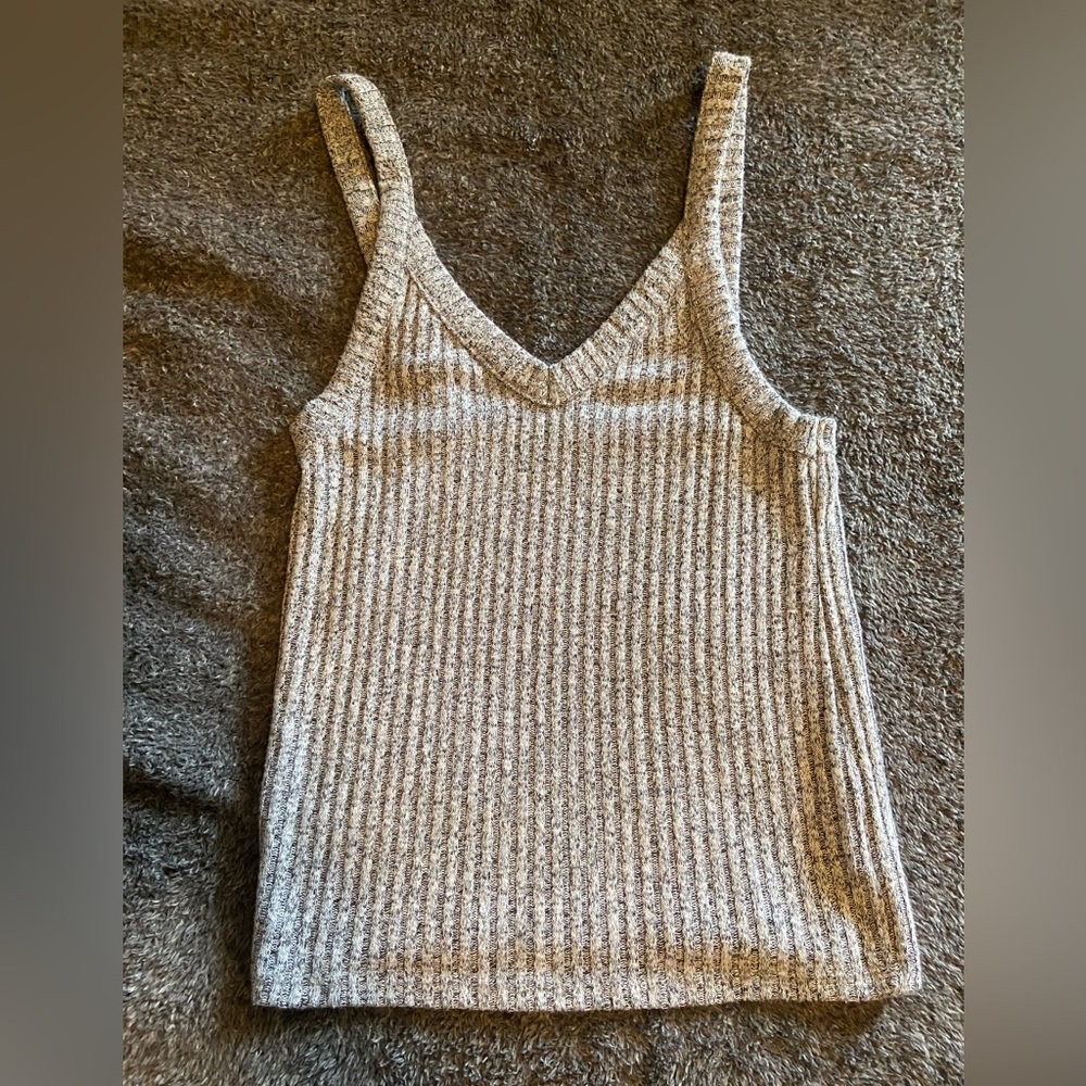 Cropped sweater tank. Ribbed detailing. Worn once, size small.